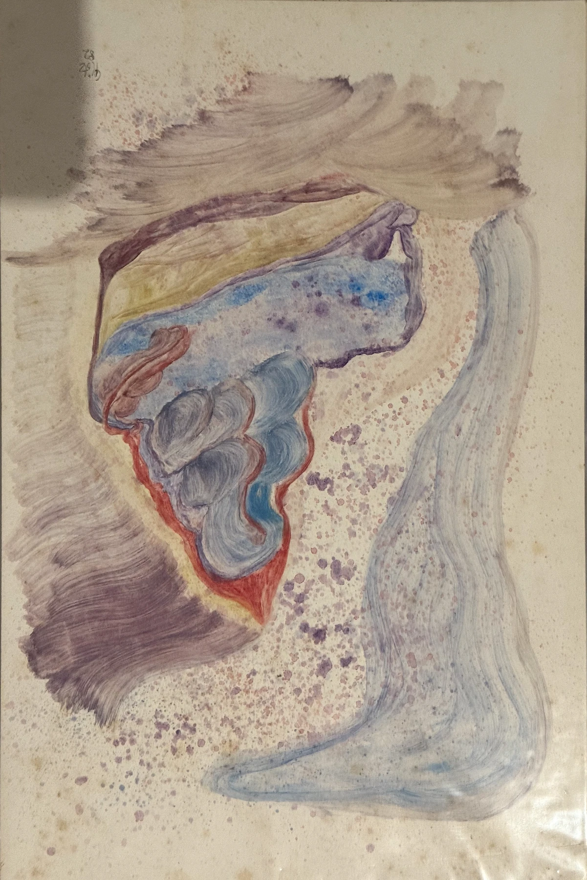 Eine kleine Insel aus Blau und Rot steht in hellen, unregelmäßigen Konturen. Der ruhige Außenbereich lässt die Farbe wirken.